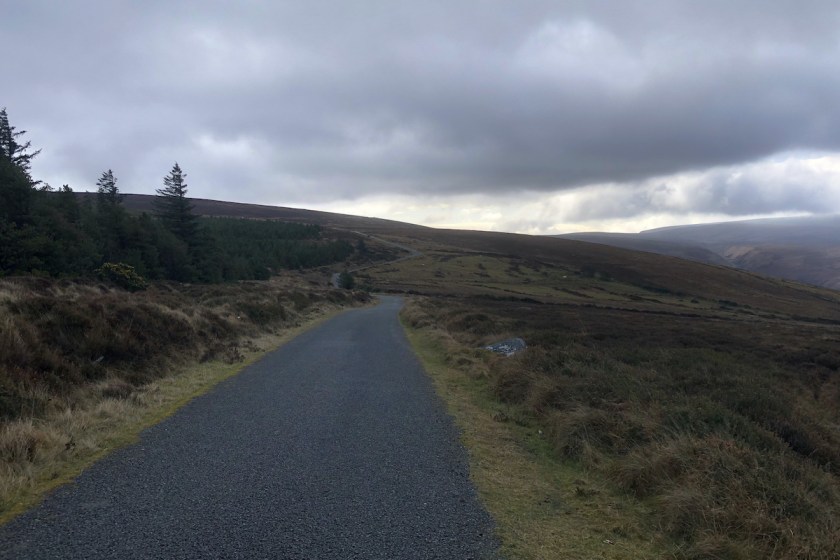 Piperstown Road snaking its way up a bleak hillside